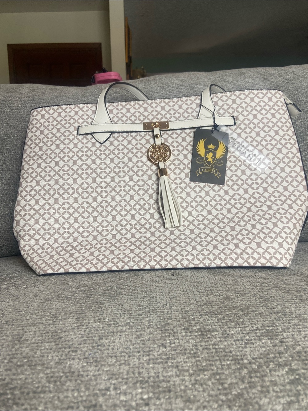 Calista vegan Peta Approved White Patterned Tote Bag with Tassel Charm